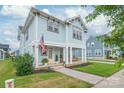 Beautiful two-story home with a classic design, featuring a welcoming front porch and lush landscaping at 257 Auburn View Rd, Rock Hill, SC 29730