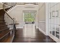 Bright foyer with a view into the living room and its large windows at 426 Kirkbride Ct, Fort Mill, SC 29715