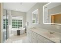 Beautiful bathroom with a standalone tub, double sink vanity, and modern fixtures at 4312 Beech Wood Ct, Belmont, NC 28012