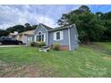 A charming one-story home with nice yard space is perfect for entertaining Gathering and friends at 7401 Merrily Ln, Charlotte, NC 28214