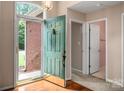 Inviting entryway with hardwood floors and a view into the home's interior at 8002 Kingston Dr, Waxhaw, NC 28173