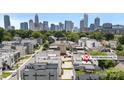 Aerial view of a modern community with the Charlotte skyline in the background at 1011 Westbrook Dr # A, Charlotte, NC 28202
