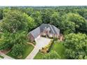 Expansive aerial view of a stately brick home with lush green surroundings at 4263 Rambling Rose Ln # 23, Rock Hill, SC 29732