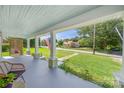 Inviting covered front porch with white columns and outdoor seating area at 124 Marion St, Clover, SC 29710
