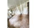 Spacious bedroom featuring unfinished drywall and hardwood floors at 129 Williams Rd, Bessemer City, NC 28016