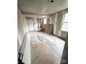 Unfinished living room space ready for customization, showcasing the potential for a personalized interior at 129 Williams Rd, Bessemer City, NC 28016