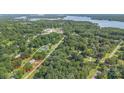 Aerial view of the property with a red outline, showing surrounding trees and neighborhood at 1593 Bloomfield Rd, Rock Hill, SC 29732
