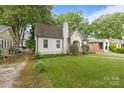 Charming home with a brick chimney and beautiful landscaping at 2130 Chesterfield Ave, Charlotte, NC 28205