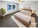 A serene main bedroom with a large window and minimalist decor at 3090 Bridgewater St, Lancaster, SC 29720
