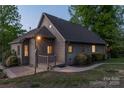 Charming home with a well-maintained lawn, mature trees, and inviting porch, offering great curb appeal at 639 Panther Point Trl, Richfield, NC 28137