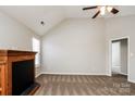 Spacious living room with carpet floors, fireplace, and neutral walls at 676 Rebecca Jane Dr, Mooresville, NC 28115