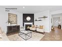 Cozy living room featuring a fireplace, modern décor, and an open floor plan at 235 Parker Claire Ln, Kings Mountain, NC 28086