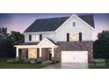 Beautiful two-story home showcasing stone veneer and a well-manicured lawn at 248 Miramar Dr, York, SC 29745