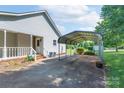 View of the metal carport located near the side of the home at 5211 Spring Gln, York, SC 29745