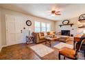 Spacious living room with fireplace, comfortable seating, and natural light at 701 Mcswain Rd, Shelby, NC 28150