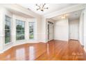 Bright entryway with hardwood floors and large windows offering ample natural light at 14911 Taggert Trail Dr, Charlotte, NC 28273