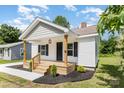 Lovely front exterior of the craftsman home featuring wood porch and nice landscaping at 210 Marshall St, Rock Hill, SC 29730