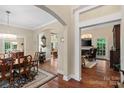 A beautiful living room showcasing an open floor plan with hardwood floors and natural light at 23 Tanglewood Rd, Clover, SC 29710