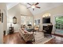 Spacious living room with high ceilings, a fireplace, and abundant natural light at 23 Tanglewood Rd, Clover, SC 29710