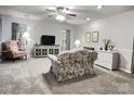 Comfortable living room with a ceiling fan and plush seating, creating an inviting atmosphere at 5434 Starflower Dr, Charlotte, NC 28215