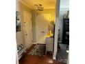 Foyer featuring modern lighting, a neutral color palette and classic details at 140 Lake Concord Ne Rd, Concord, NC 28025