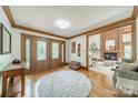 Elegant foyer with hardwood floors, decorative doors, and ample natural light at 2332 Hemby Pl, Charlotte, NC 28270