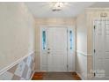 Welcoming entryway with tiled accents, wooden floors, and a view into the home at 3114 Pine Pointe St, Matthews, NC 28104