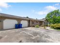 View of attached two-car garage and driveway including side view of home at 5563 Grace Chapel Rd, Hickory, NC 28601