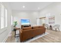 Open-concept living room with bright interior and ample natural light showcasing modern design at 8438 Henry Harris Rd, Fort Mill, SC 29707