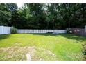 View of the fenced in backyard and features a cozy firepit area at 1288 Shenandoah Cir, Rock Hill, SC 29730