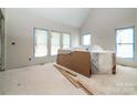 Large living room featuring tall ceilings, ready for customization and design at 236 Mark Ryan Ln, Dallas, NC 28034