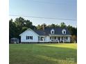 Beautiful two-story home with a spacious front lawn, covered porch, and a shed in the backyard at 250 Wesley Amaker Rd, York, SC 29745