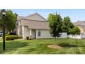 Well-manicured lawn on the side of a charming house, enhanced by mature trees and greenery at 448 River Park Rd, Belmont, NC 28012