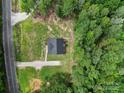 Aerial view of the home situated on a well-maintained lot with mature trees at 4592 Reid Rd, Edgemoor, SC 29712