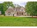Charming home with manicured lawn, showcasing its architectural details at 6216 North Rd, York, SC 29745