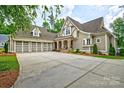 A view of the front of the house showing a three-car garage at 6216 North Rd, York, SC 29745