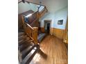 Inviting foyer showcasing the hardwood floors and an open staircase to the second story at 716 N Fulton St, Salisbury, NC 28144
