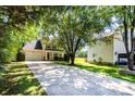 Two-story home with a spacious driveway and green lawn at 9808 Steed Ct, Charlotte, NC 28269