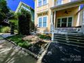 Beautiful home exterior with a lovely landscaped yard and inviting front porch at 751 Terrace Park, Rock Hill, SC 29730