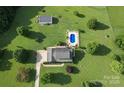 Overhead aerial view of the home, pool, outbuildings and grounds showing the property layout at 212 Countryside Rd, Kings Mountain, NC 28086