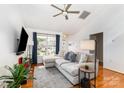 Comfortable living room with a large sofa, and lots of natural light at 409 Lexie Ln, Rock Hill, SC 29732