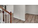 Hallway featuring luxury vinyl plank flooring and neutral paint at 11538 Ardrey Crest Dr, Charlotte, NC 28277