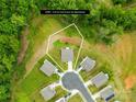 Aerial view showcasing the neighborhood and location of the property on 0.33 acres, providing a sense of community at 132 Sycamore Crossing Ct, Locust, NC 28097