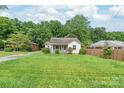 Beautiful front yard featuring a well-maintained lawn and classic home at 2722 Eastway Dr, Charlotte, NC 28205