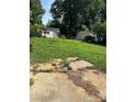 Large backyard with shed, offering ample space for outdoor activities and storage at 5200 Queen Anne Rd, Charlotte, NC 28217