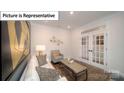 Comfortable living room with stylish furniture, complemented by modern decor and warm lighting at 7123 Sylvan Retreat Dr, Denver, NC 28037