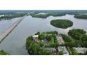 Stunning aerial view of lakeside condos offering tranquil living with easy access to water and nature at 921 Northeast Dr, Davidson, NC 28036