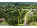 Aerial view of a home and property with mature trees and landscaping at 1115 Sides Rd, Salisbury, NC 28146