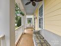 Relaxing front porch featuring comfortable seating and views of the community at 2003 Trigger Dr, Indian Trail, NC 28079