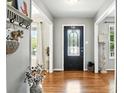 Inviting foyer features hardwood floors and an elegant stained-glass front door at 2367 24Th Street Ne Ln, Hickory, NC 28601